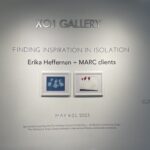 Find Inspiration in Isolation Exhibition Two art pieces on a wall in the XOJ Gallery